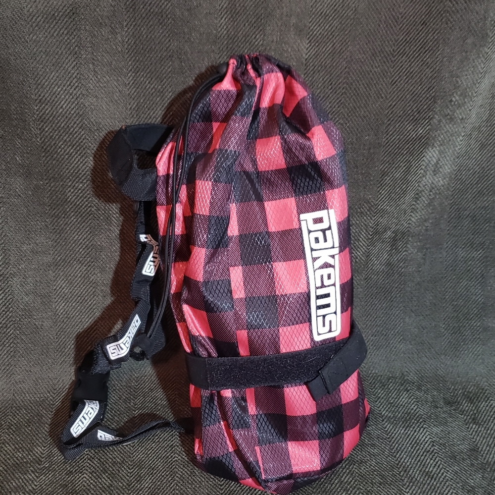 Pakems pink plaid snow booties, size 10